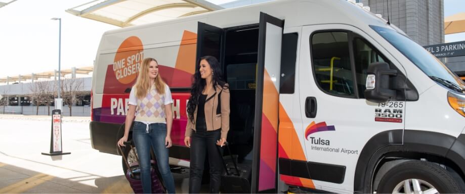 passengers exit transport van
